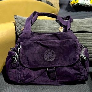 Never used purple bag